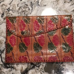 Tooled leather clutch
